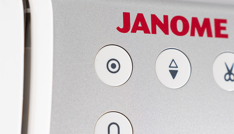 Janome Memory Craft 6700P Automatic lock-off stitch button